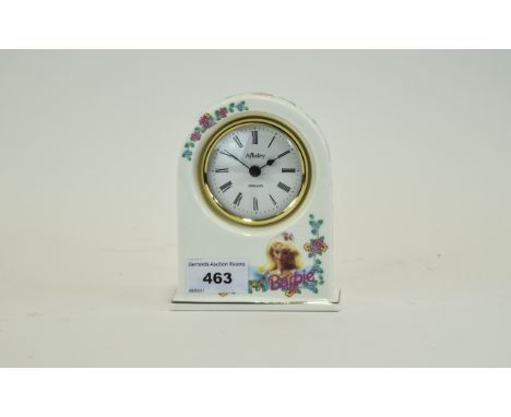 Aynsley Bone China Barbie Mantle Clock Small clock in cream china with pink, yellow, blue and green floral pattern. Features 