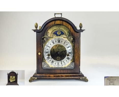 Franz Hermle Oak Cased Key-Wind Striking and Chiming Mantel Clock, Strikes on 5 Rods, Two Jewels with Moon and Sun Dial with 