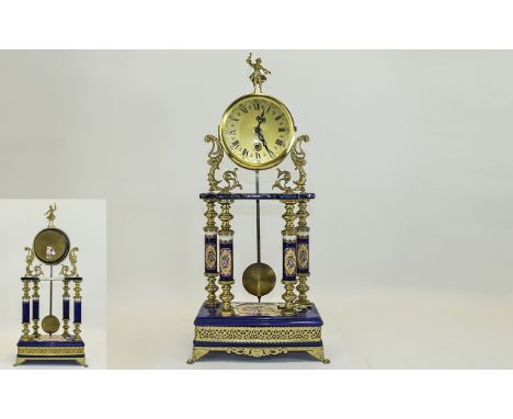 French Style Portico Clock. Modern French style clock, enamelled pillars and base with gilt fretwork. Key wound movement. H 1