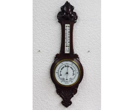 Early 20th Century Carved Mahogany Aneroid Wheel Barometer with Thermometer. Dial 8 Inches. c.1910. Height 37 Inches. Excelle