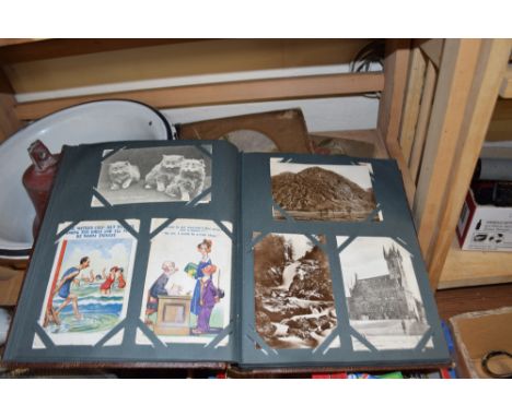 THREE ALBUMS OF VINTAGE POSTCARDS