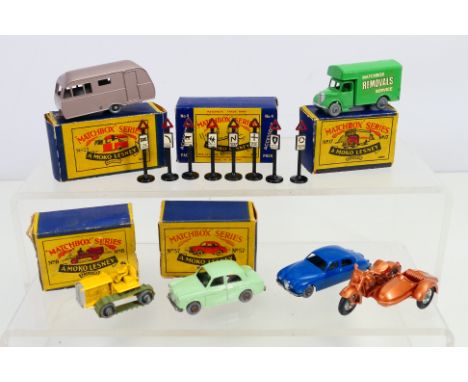 Matchbox - A collection of models including a boxed Bedford Removal Van # 17, Bluebird Caravan # 23, Road Sign Set # A4, Harl