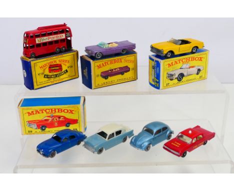 Matchbox - A group of models including a boxed Mercedes 230SL in dull yellow # 27, Pontiac Convertible # 39, Jaguar 3.4 # 65,