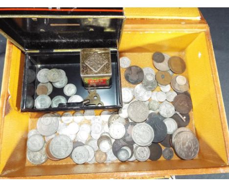 Numismatology - a miniature leather briefcase with key containing a quantity of UK and worldwide coins to include a quantity 