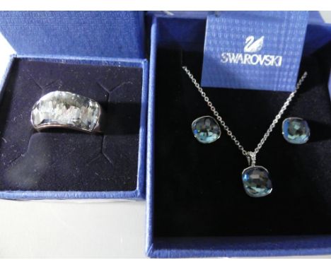 Swarovski - a good quality Swarovski ring size M and a half in original Swarovski box and a Swarovski evening set to include 