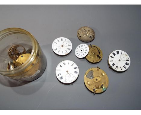 A mixed lot of pocket watch parts to include complete movement by Benjamin Graham, Wakefield, and a selection of movement par