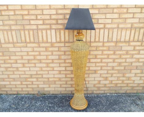 Good quality wicker standard lamp approximately 156 cm [h], including shade.