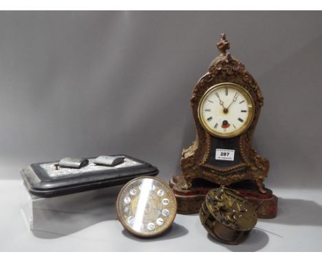 A mixed lot to include a French boulle mantel clock case and matching plinth, 35cm tall with cast finial, two associated move