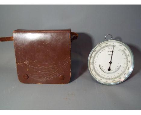 A Hohenmesser barometer, contained in original carry case approximately 10 cm [d].