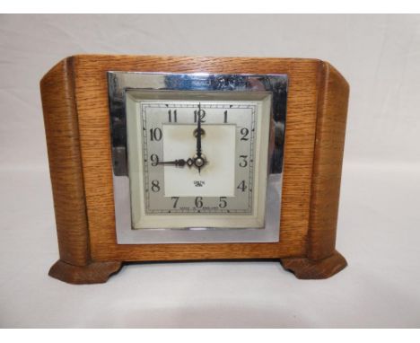 An Art Deco styled oak and chrome Smiths mantel clock