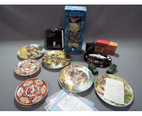 A good mixed lot to include a quantity of Wedgwood collector plates with certificate, Asian style plates, a Regency Fine Arts