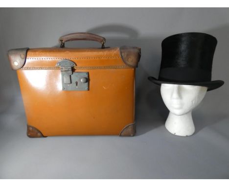A vintage Lock&amp;Co silk top hat internal circumference approximately 21 inches in Verilite vulcanised fiber and leather tr