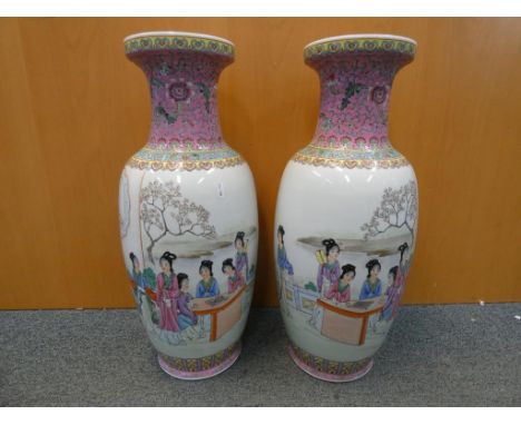 A pair of large Chinese vases, depicting ladies in a garden setting, Ruyi border to the neck, seal mark to the base, approxim