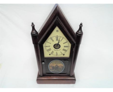 A late 19th/ early 20th century American-made steeple clock, signed to the dial for Seth Thomas, matching S and T hands, maho