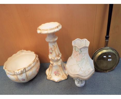 A large ceramic jardiniere with matching stand, a copper bed warmer and a Spanish ceramic table lamp with foliate decoration 