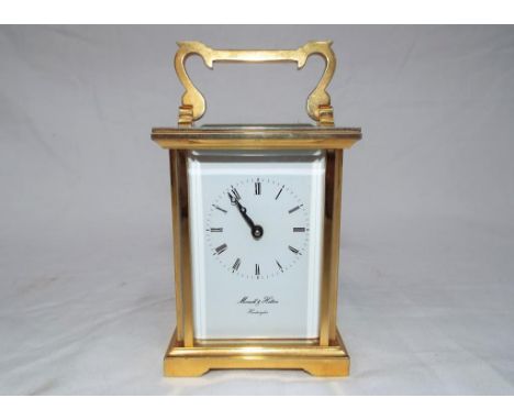 A good brass cased timepiece only mechanical carriage clock, white enamel dial with Roman numerals signed Morrell &amp; Hilto