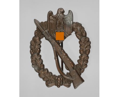 Infanterie-Sturmabzeichen in BronzeZinkausführung bronziert, Hersteller R.S. (Rudolf Souval, Wien), guter Zustand mit leichte