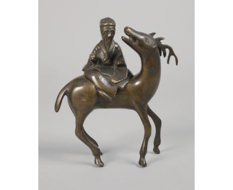 Figürlicher Weihrauchbrennerwohl 19. Jh., ungemarkt, Bronze zweiteilig gegossen, bräunlich patiniert, Darstellung des auf ein