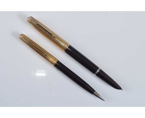 A vintage Parker 51 fountain pen and pencil set, in Plum with gold trim, each plum barrel engraved MADE IN USA 8, the gold to