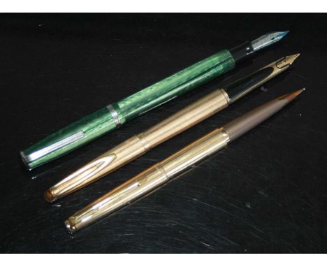 An Esterbrook J fountain pen, in foliage green with steel trim, the 'sunburst' nib marked ESTERBROOK 3668 OSMIRIDIUM TIP MADE
