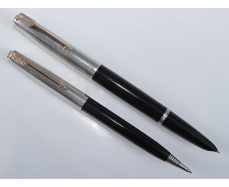 A cased Parker 51 fountain pen and pencil set, in black with silver caps, the pen barrel faintly inscribed MADE IN ENGLAND 2,