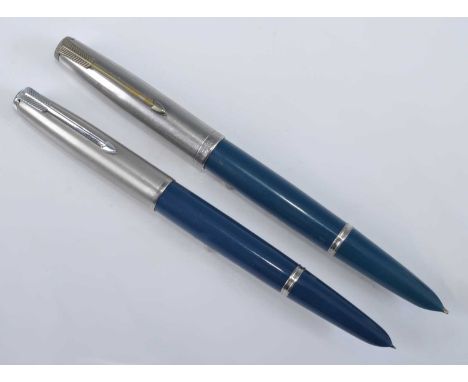 Two Parker 51 fountain pens, in teal with silver trim, each faintly engraved to the barrels; one made USA and the other (bein