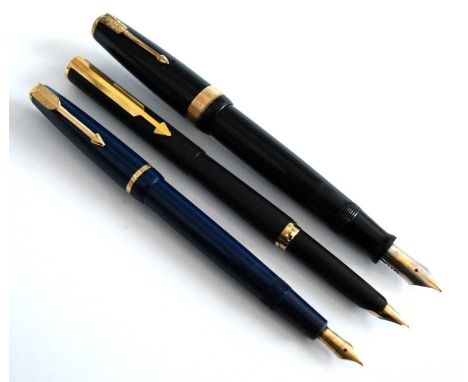 Three vintage Parker fountain pens, comprising a Slimfold 'British Duofold' in navy blue with gold colour trim, the barrel ma