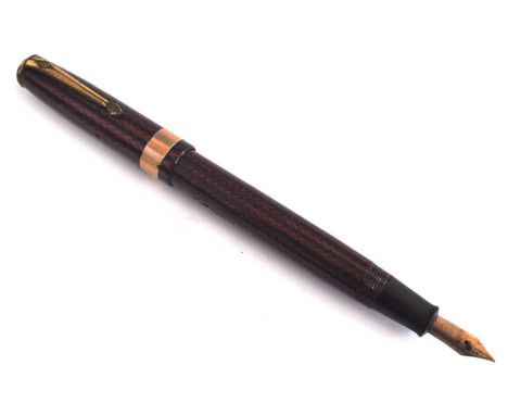 A Conway Stewart 27 fountain pen, in red herringbone with gold trim, the barrel engraved Conway Stewart 278 MADE IN ENGLAND, 