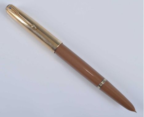 A Parker 51 double jewelled fountain pen, in Buckskin Beige with gold trim, the barrel engraved PARKER "51" 5. MADE IN U.S.A.