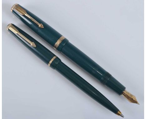 A Parker Duofold fountain pen and ballpoint pen set, in emerald green with gold trim, the fountain barrel engraved PARKER DUO