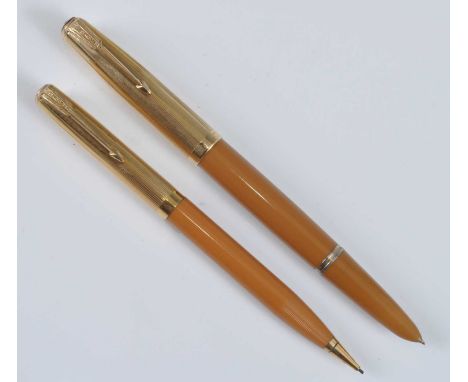 A vintage Parker 51 fountain pen and pencil, in Mustard with gold trim, the fountain pen barrel engraved PARKER "51" 5 MADE I