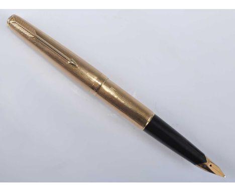 A Parker 65 Custom Insignia double-jewelled fountain pen, in 9ct gold Waterdrop design, the barrel hallmarked and with monogr
