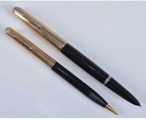 A Parker 51 fountain pen and pencil set, in black with gold trim, the pen barrel engraved PARKER "51" .4. MADE IN U.S.A., the