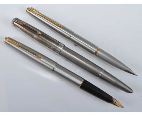 Three Parker fountain pens, one being a 51 Titanium by Ralph Prather, having sterling silver cap with blue diamond PARKER cli