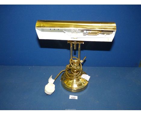 A brass Desk Lamp.