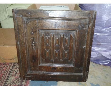 A small Elizabeth I cupboard Door, set with linen fold panel, English late 16th century, 22'' x 22''