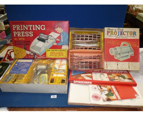 A Chad Valley Printing Press with two colour printing in original box, Show-a-Slide slides (no projector) and a boxed Spirogr