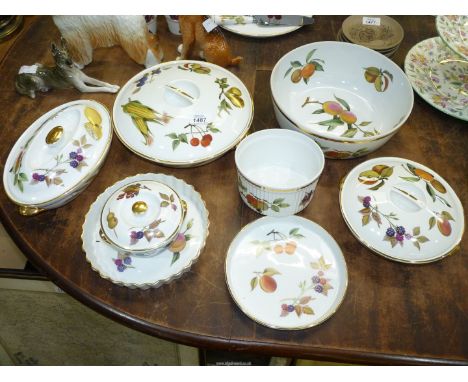 A quantity of Royal Worcester 'Evesham' dinner and cookware including large and medium tureens, fruit bowl, flan dishes etc.