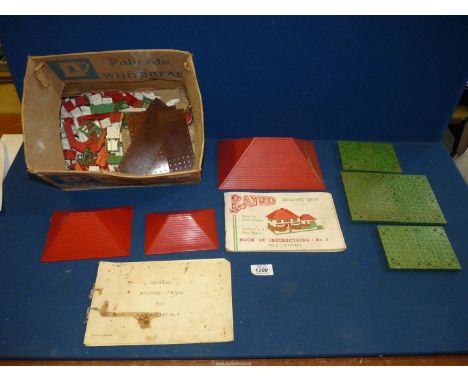 A vintage Bayko building set, no. 3 with plans and catalogue.