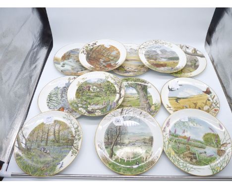 Twelve Royal Worcester 'Nature Scenes' Franklin porcelain display plates by Peter Banett.