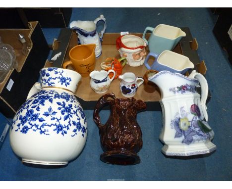 A quantity of jugs including Wade Scotch Whisky, brown with greyhound handle, small Crayfish design etc.