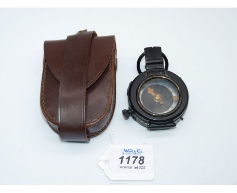 An interesting vintage compass in a custom made leather case stamped ENGLAND.