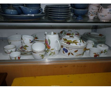 A quantity of Royal Worcester 'Evesham' and 'Evesham Vale' tableware including two large lidded serving dishes, dinner and si