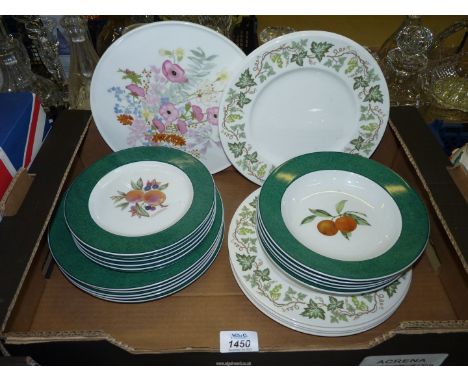 A Wedgwood cake plate 'Meadow Sweet' pattern, Wedgwood and Royal Worcester plates, side plates and soup bowls.