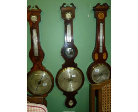 A Mahogany banjo style mercury Barometer by Silvester, Bromwich, 42 3/4'' tall overall.