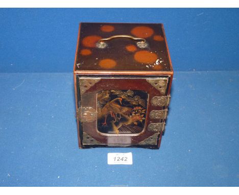 A Meiji period Japanese Kodensu with lacquered central panel of Herons and three internal drawers also lacquered with scenes,