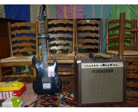 A vintage 'Carlsbro Sherwood 65' amplifier and electric guitar.