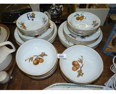 A quantity of Royal Worcester 'Evesham' dinnerware: eight each dessert bowls, dinner and side plates and six soup bowls.