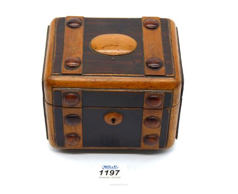A highly unusual Victorian Walnut tea Caddy formed to represent a traveller's steam trunk, the interior lids and some exterio