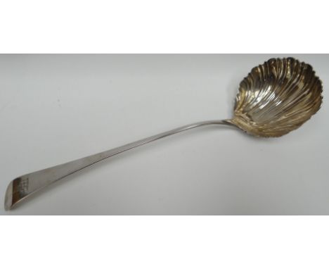 A George III long-handled soup-ladle with shell-bowl and having an engraved 'elephant and castle' heraldic crest to the curve